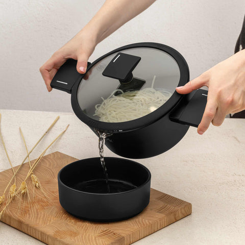 Product image of Casserole with lid 20cm. Part of the Matte Black Collection . Features: • Material: forged aluminum with non-stick titanPro coating • Casserole with lid Ø20*11 cm 2,5L • Color: black- silver. (Studio view). Official Berlinger Haus product, boosted by Promintra sl.