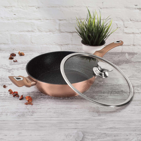 Product image of Deep frypan with lid 28cm. Part of the Metallic Line Rose Gold Edition . Features: • Material: forged aluminum • Deep frypan with lid Ø28*7,5 cm 3,8L • Color: metallic rose gold REGISTERED DESIGN BY BERLINGER HAUS!. (Studio view). Official Berlinger Haus product, boosted by Promintra sl.