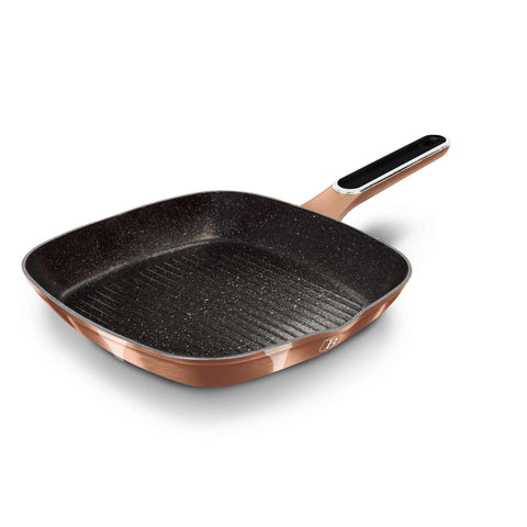Product image of Grill pan 28cm. Part of the Metallic Line Rose Gold Edition . Features: • Material: forged aluminum • Grill pan Ø28*4,1 cm 2,1L • Color: metallic rose gold REGISTERED DESIGN BY BERLINGER HAUS!. (Studio view). Official Berlinger Haus product, boosted by Promintra sl.