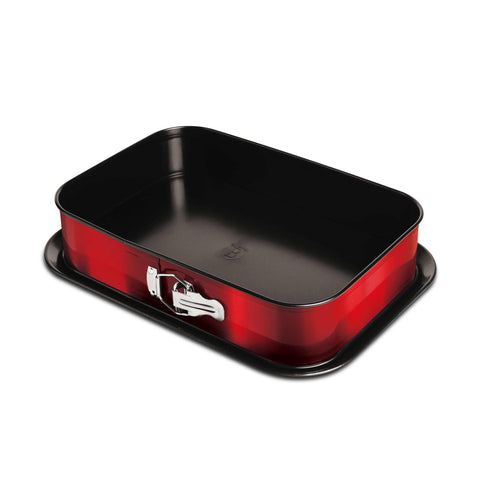 Product image of Rectangle springform 39x27cm. Part of the Metallic Line Burgundy Edition . Features: • Material: carbon steel with titan non-stick coating • Size: 35*23*6,5 cm • Base size: 39*27 cm • Color: metallic burgundy. (Studio view). Official Berlinger Haus product, boosted by Promintra sl.