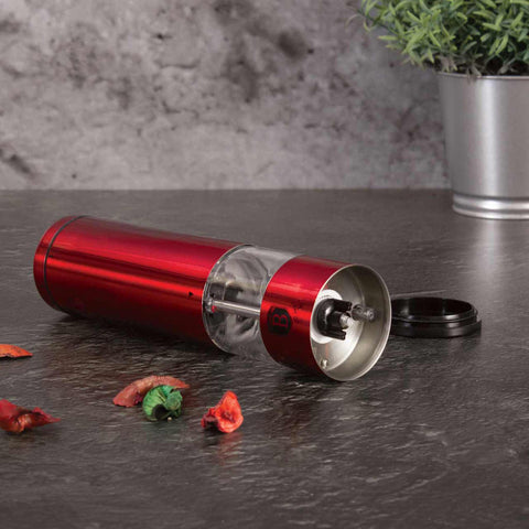 Product image of Electric pepper and salt mill. Part of the Metallic Line Burgundy Edition . Features: • Material: stainless steel with CERAMIC grinder • Batteries: 4 pcs AA (not inc.) • WITH LIGHT • Color: burgundy. (Studio view). Official Berlinger Haus product, boosted by Promintra sl.