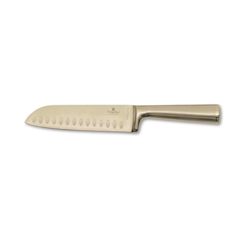 Product image of Santoku knife 17,5cm. Part of the Sahara Collection/Leonardo Collection . Features: • Material: stainless steel with satin and mirror polish handle • Size: 17,5 cm • Color: gold. (Studio view). Official Berlinger Haus product, boosted by Promintra sl.