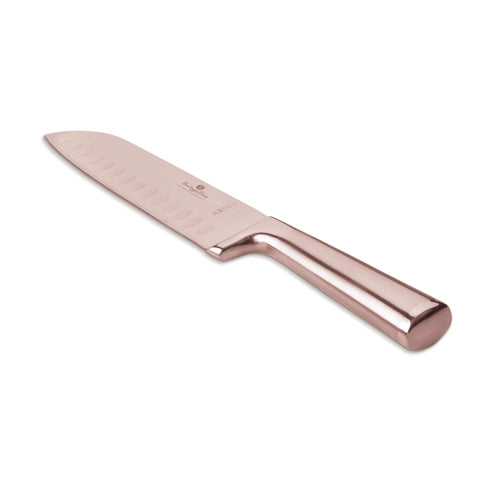 Product image of Santoku knife 17,5cm. Part of the Taupe Collection/Black Rose Collection . Features: • Material: stainless steel with satin and mirror polish handle • Size: 17,5 cm • Color: rose gold. (Studio view). Official Berlinger Haus product, boosted by Promintra sl.
