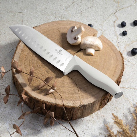 Imatge del producte d'un joc de ganivets de 10 peces amb estand BAMBOO. Part de la col·lecció Sahara. Característiques: • Material: acer inoxidable • Ganivet Xef 20 cm • Ganivet de pa 20 cm • Ganivet Santoku 17,5 cm • Ganivet multiusos 12,5 cm • Ganivet de pelar 9 cm • Ganivet de carn... (Vista d'estudi). Producte oficial Berlinger, impulsat per Promintra sl.