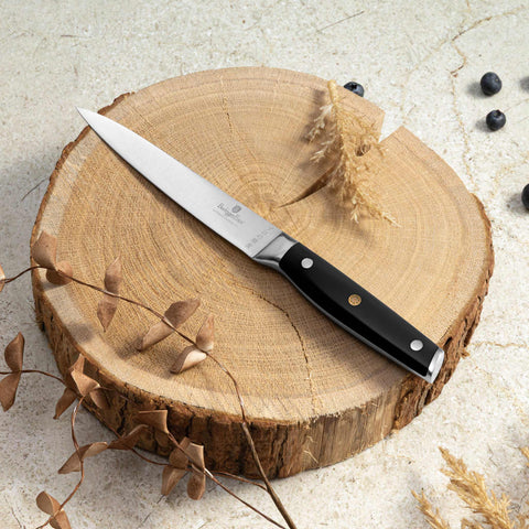 Product image of Utility knife 12,5cm. Part of the Black Vantage Collection/Matte Black Collection/Black Silver Collection . Features: • Material: stainless steel • Size: 12,5 cm • Color: black- silver. (Studio view). Official Berlinger Haus product, boosted by Promintra sl.