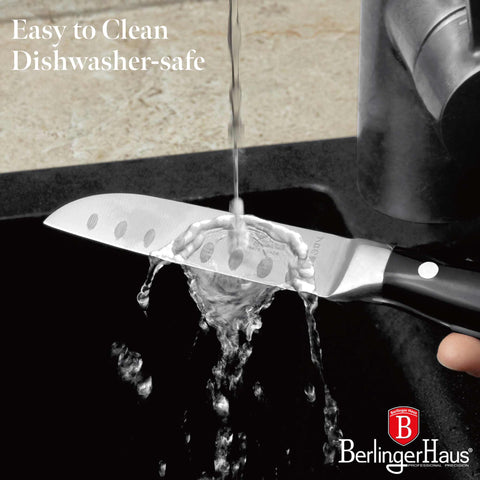 Product image of Santoku knife 9cm. Part of the Black Vantage Collection/Matte Black Collection/Black Silver Collection . Features: • Material: stainless steel • Size: 9 cm • Color: black- silver. (Studio view). Official Berlinger Haus product, boosted by Promintra sl.