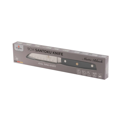 Product image of Santoku knife 9cm. Part of the Black Vantage Collection/Matte Black Collection/Black Silver Collection . Features: • Material: stainless steel • Size: 9 cm • Color: black- silver. (Studio view). Official Berlinger Haus product, boosted by Promintra sl.