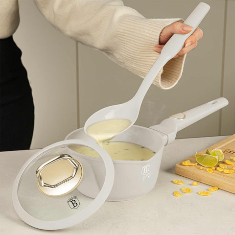 Product image of 12pcs knife and kitchen tool set with BAMBOO cutting board and stand. Part of the Sahara Collection . Features: • Material: stainless steel, nylon, plastic • Chef knife 20 cm • Bread knife 20 cm • Santoku knife 17,5 cm • Utility knife 12,5 cm • Paring knife 9.... (Studio view). Official Berlinger Haus product, boosted by Promintra sl.
