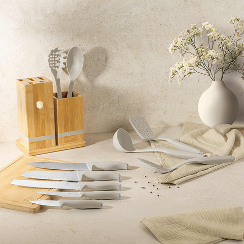 Product image of 12pcs knife and kitchen tool set with BAMBOO cutting board and stand. Part of the Sahara Collection . Features: • Material: stainless steel, nylon, plastic • Chef knife 20 cm • Bread knife 20 cm • Santoku knife 17,5 cm • Utility knife 12,5 cm • Paring knife 9.... (Studio view). Official Berlinger Haus product, boosted by Promintra sl.