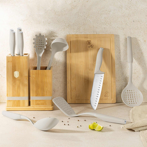 Product image of 12pcs knife and kitchen tool set with BAMBOO cutting board and stand. Part of the Sahara Collection . Features: • Material: stainless steel, nylon, plastic • Chef knife 20 cm • Bread knife 20 cm • Santoku knife 17,5 cm • Utility knife 12,5 cm • Paring knife 9.... (Studio view). Official Berlinger Haus product, boosted by Promintra sl.