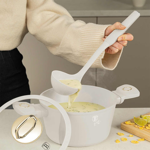 Product image of 12pcs knife and kitchen tool set with BAMBOO cutting board and stand. Part of the Sahara Collection . Features: • Material: stainless steel, nylon, plastic • Chef knife 20 cm • Bread knife 20 cm • Santoku knife 17,5 cm • Utility knife 12,5 cm • Paring knife 9.... (Studio view). Official Berlinger Haus product, boosted by Promintra sl.