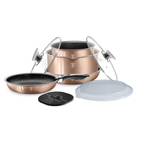 Product image of 10pcs cookware set. Part of the Metallic Line Rose Gold Edition . Features: • Material: aluminum • Include: • STACKABLE - SPACE SAVING • Frypan Ø20*4,5 cm 1,0L • Frypan Ø24*4,8 cm 1,7L • Sauce pan with mouth Ø16*7,5 cm 1,2L.... (Studio view). Official Berlinger Haus product, boosted by Promintra sl.