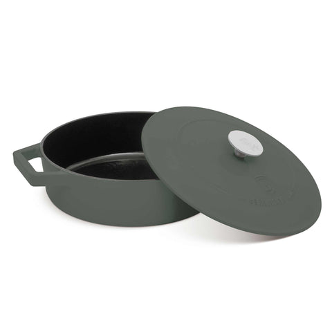 Product image of Shallow pot 26cm cast iron. Part of the Matte Green Collection . Features: • Material: cast iron with 3 layers shiny ENAMEL coating • Size: Ø26*7,5 cm 2,57 L • Color: matt green. (Studio view). Official Berlinger Haus product, boosted by Promintra sl.