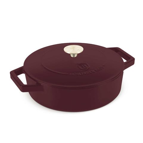 Product image of Shallow pot 26cm cast iron. Part of the Leonardo Collection . Features: • Material: cast iron with 3 layers shiny ENAMEL coating • Size: Ø26*7,5 cm 2,57 L • Color: matt bordeaux- white. (Studio view). Official Berlinger Haus product, boosted by Promintra sl.