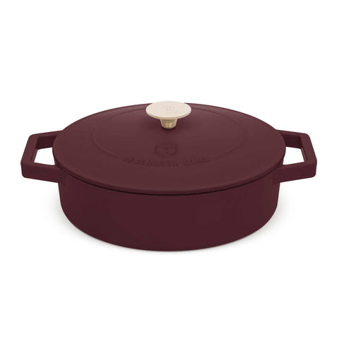 Product image of Shallow pot 26cm cast iron. Part of the Leonardo Collection . Features: • Material: cast iron with 3 layers shiny ENAMEL coating • Size: Ø26*7,5 cm 2,57 L • Color: matt bordeaux- white. (Studio view). Official Berlinger Haus product, boosted by Promintra sl.
