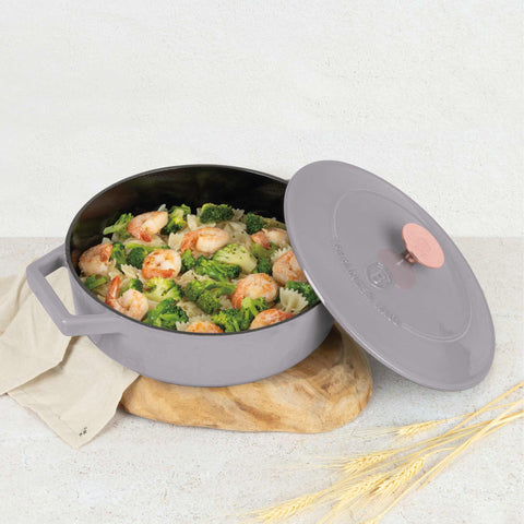 Product image of Shallow pot 26cm cast iron. Part of the Taupe Collection . Features: • Material: cast iron with 3 layers shiny ENAMEL coating • Size: Ø26*7,5 cm 2,57 L • Color: taupe. (Studio view). Official Berlinger Haus product, boosted by Promintra sl.