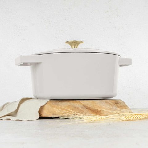 Product image of Casserole 24cm cast iron. Part of the Sahara Collection . Features: • Material: cast iron with 3 layers shiny ENAMEL coating • Size: Ø24*11 cm 4,35 L • Color: cream. (Studio view). Official Berlinger Haus product, boosted by Promintra sl.