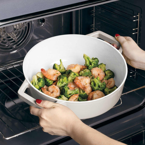 Product image of Shallow pot 26cm cast iron. Part of the Sahara Collection . Features: • Material: cast iron with 3 layers shiny ENAMEL coating • Size: Ø26*7,5 cm 2,57 L • Color: cream- white. (Studio view). Official Berlinger Haus product, boosted by Promintra sl.