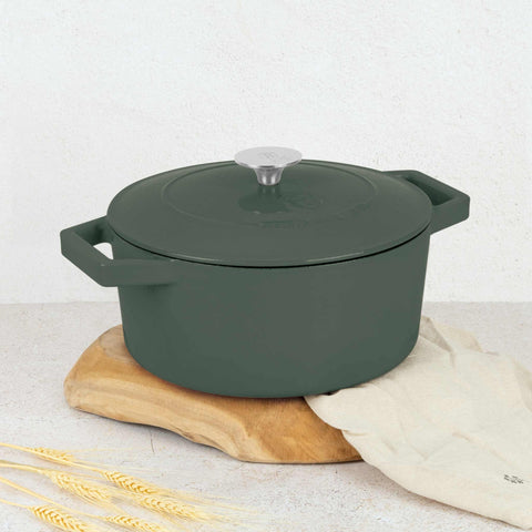 Product image of Casserole 24cm cast iron. Part of the Matte Green Collection . Features: • Material: cast iron with 3 layers shiny ENAMEL coating • Size: Ø24*11 cm 4,35 L • Color: matt green. (Studio view). Official Berlinger Haus product, boosted by Promintra sl.