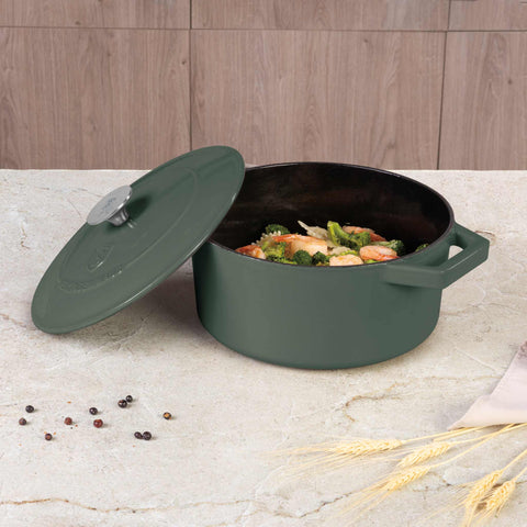 Product image of Casserole 24cm cast iron. Part of the Matte Green Collection . Features: • Material: cast iron with 3 layers shiny ENAMEL coating • Size: Ø24*11 cm 4,35 L • Color: matt green. (Studio view). Official Berlinger Haus product, boosted by Promintra sl.