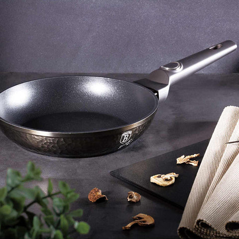 Product image of Frypan 20cm. Part of the Primal Gloss Collection . Features: • Material: forged aluminum • Frypan Ø20*4,5 cm 1,0L • Color: dark grey with black shadow and shining hammer effect REGISTERED DESIGN BY BERLINGER .... (Studio view). Official Berlinger Haus product, boosted by Promintra sl.