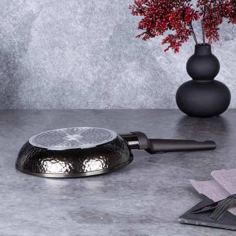 Product image of Frypan 20cm. Part of the Primal Gloss Collection . Features: • Material: forged aluminum • Frypan Ø20*4,5 cm 1,0L • Color: dark grey with black shadow and shining hammer effect REGISTERED DESIGN BY BERLINGER .... (Studio view). Official Berlinger Haus product, boosted by Promintra sl.