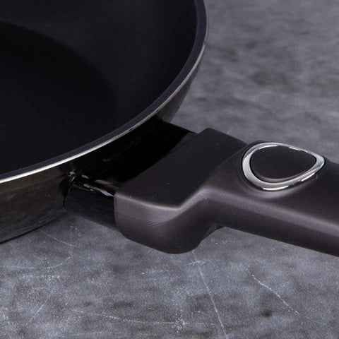 Product image of Frypan 20cm. Part of the Primal Gloss Collection . Features: • Material: forged aluminum • Frypan Ø20*4,5 cm 1,0L • Color: dark grey with black shadow and shining hammer effect REGISTERED DESIGN BY BERLINGER .... (Studio view). Official Berlinger Haus product, boosted by Promintra sl.