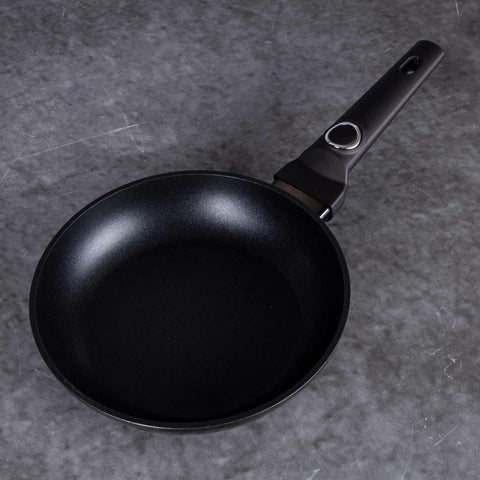 Product image of Frypan 20cm. Part of the Primal Gloss Collection . Features: • Material: forged aluminum • Frypan Ø20*4,5 cm 1,0L • Color: dark grey with black shadow and shining hammer effect REGISTERED DESIGN BY BERLINGER .... (Studio view). Official Berlinger Haus product, boosted by Promintra sl.