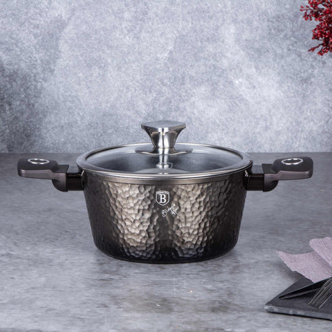 Product image of Casserole with lid 20cm. Part of the Primal Gloss Collection . Features: • Material: forged aluminum • Casserole with lid Ø20*10,4 cm 2,5L • Color: dark grey with black shadow and shining hammer effect REGISTERED DESIGN .... (Studio view). Official Berlinger Haus product, boosted by Promintra sl.