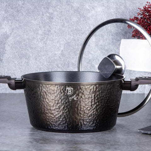 Product image of Casserole with lid 24cm. Part of the Primal Gloss Collection . Features: • Material: forged aluminum • Casserole with lid Ø24*11,8 cm 4,1L • Color: dark grey with black shadow and shining hammer effect REGISTERED DESIGN .... (Studio view). Official Berlinger Haus product, boosted by Promintra sl.
