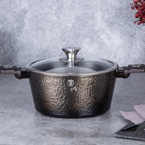 Product image of Casserole with lid 24cm. Part of the Primal Gloss Collection . Features: • Material: forged aluminum • Casserole with lid Ø24*11,8 cm 4,1L • Color: dark grey with black shadow and shining hammer effect REGISTERED DESIGN .... (Studio view). Official Berlinger Haus product, boosted by Promintra sl.