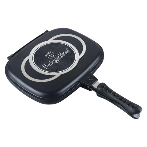 Product image of Double frypan 32cm. Part of the Granit Diamond Line . Features: • Material: cast aluminium • Size: 32*24*7 cm • Color: matt black and orange. (Studio view). Official Berlinger Haus product, boosted by Promintra sl.