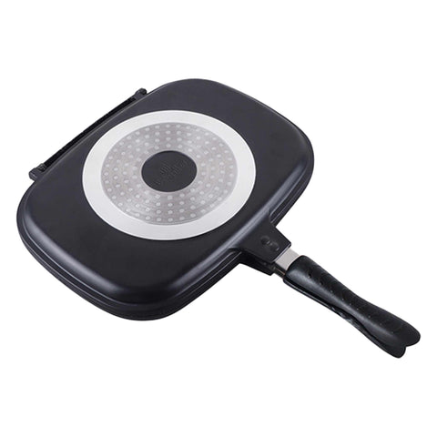 Product image of Double frypan 36cm,. Part of the Granit Diamond Line . Features: • Material: cast aluminium • Size: 36*24,7*7,5 cm • Color: matt black and orange. (Studio view). Official Berlinger Haus product, boosted by Promintra sl.