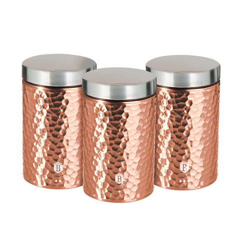 Product image of 3pcs canister set. Part of the Metallic Line Rose Gold Edition . Features: • Material: stainless steel • Include: • Sugar canister Ø11*17,8 cm • Tea canister Ø11*17,8 cm • Coffee canister Ø11*17,8 cm • Outside color: metal.... (Studio view). Official Berlinger Haus product, boosted by Promintra sl.
