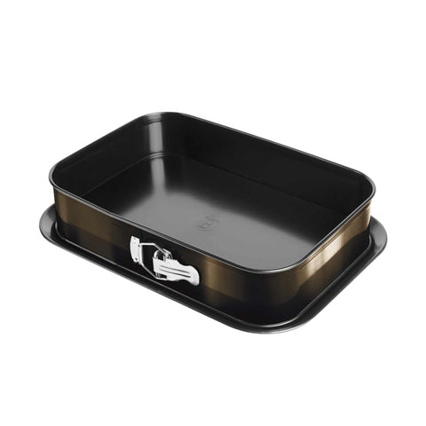 Product image of Rectangle springform 39x27cm. Part of the Metallic Line Shiny Black Edition . Features: • Material: carbon steel with titan non-stick coating • Size: 35*23*6,5 cm • Base size: 39*27 cm • Color: metallic black. (Studio view). Official Berlinger Haus product, boosted by Promintra sl.