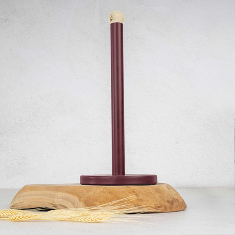 Product image of Kitchen roll holder. Part of the Leonardo Collection . Features: • Material: stainless steel with matt black coating • Size: 15*34 cm • Color: matt bordeaux. (Studio view). Official Berlinger Haus product, boosted by Promintra sl.