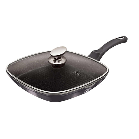 Imatge del producte de la paella amb tapa de 28 cm. Forma part de la Metallic Line Carbon Pro Edition. Característiques: • Material: alumini forjat • Paella de graella Ø28*4,1 cm 2,1L • Color: gris fosc metàl·lic DISSENY REGISTRAT DE BERLINGER HAUS!. (Vista de l'estudi). Producte oficial de Berlinger, impulsat per Promintra sl.