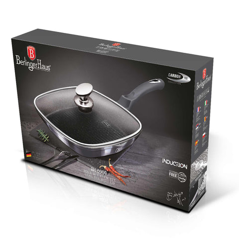 Imatge del producte de la paella amb tapa de 28 cm. Forma part de la Metallic Line Carbon Pro Edition. Característiques: • Material: alumini forjat • Paella de graella Ø28*4,1 cm 2,1L • Color: gris fosc metàl·lic DISSENY REGISTRAT DE BERLINGER HAUS!. (Vista de l'estudi). Producte oficial de Berlinger, impulsat per Promintra sl.