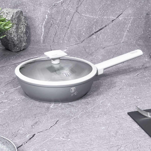 Product image of Deep frypan with lid 24cm. Part of the Aspen Collection . Features: • Material: forged aluminum with grey titan non-stick coating • Deep frypan with lid Ø24*6,5 cm 2,3L • Color: matt grey REGISTERED DESIGN BY BERLIN.... (Studio view). Official Berlinger Haus product, boosted by Promintra sl.
