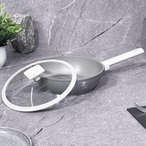 Product image of Deep frypan with lid 24cm. Part of the Aspen Collection . Features: • Material: forged aluminum with grey titan non-stick coating • Deep frypan with lid Ø24*6,5 cm 2,3L • Color: matt grey REGISTERED DESIGN BY BERLIN.... (Studio view). Official Berlinger Haus product, boosted by Promintra sl.