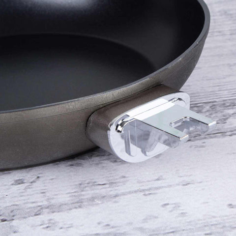 Product image of Frypan 28cm with detachable handle. Part of the Crystal Collection . Features: • Material: forged aluminum • Frypan Ø28*5,2 cm 2,4L • Plastic lid Ø28 cm • STACKABLE - SPACE SAVING • Color: dark champagne • OVEN SAFE, IF THE HA.... (Lifestyle view). Official Berlinger Haus product, boosted by Promintra sl.
