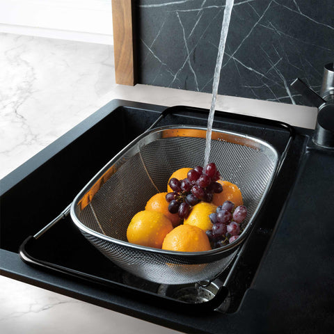 Product image of Flexible mesh basket with adjustable handles. Part of the kitchen accessories . Features: • Material: 18/10 stainless steel • Size: 34*24*11 cm. (Studio view). Official Berlinger Haus product, boosted by Promintra sl.