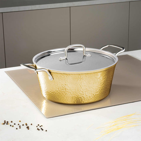 Product image of Casserole with lid 28cm. Part of the Hammered Gold Collection . Features: • Material: forged aluminum with non-stick marble coating • Casserole with lid Ø28*12,4 cm, 6,1L • Color: light gold REGISTERED DESIGN BY BERLINGER.... (Studio view). Official Berlinger Haus product, boosted by Promintra sl.