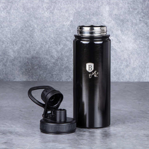 Product image of Sport bottle 540ml. Part of the Metallic Line Shiny Black Edition . Features: • Material: inner body 18/10 stainless steel • Capacity: 540 ml • Color: metallic black • Packing: half giftbox. (Studio view). Official Berlinger Haus product, boosted by Promintra sl.