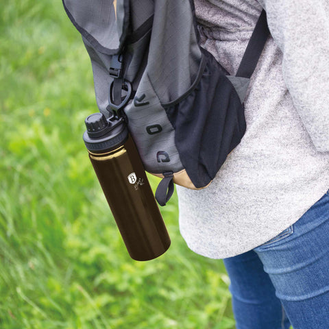 Product image of Sport bottle 540ml. Part of the Metallic Line Shiny Black Edition . Features: • Material: inner body 18/10 stainless steel • Capacity: 540 ml • Color: metallic black • Packing: half giftbox. (Studio view). Official Berlinger Haus product, boosted by Promintra sl.