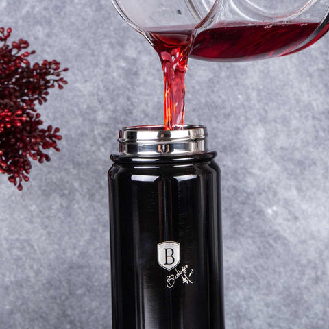 Product image of Sport bottle 540ml. Part of the Metallic Line Shiny Black Edition . Features: • Material: inner body 18/10 stainless steel • Capacity: 540 ml • Color: metallic black • Packing: half giftbox. (Studio view). Official Berlinger Haus product, boosted by Promintra sl.