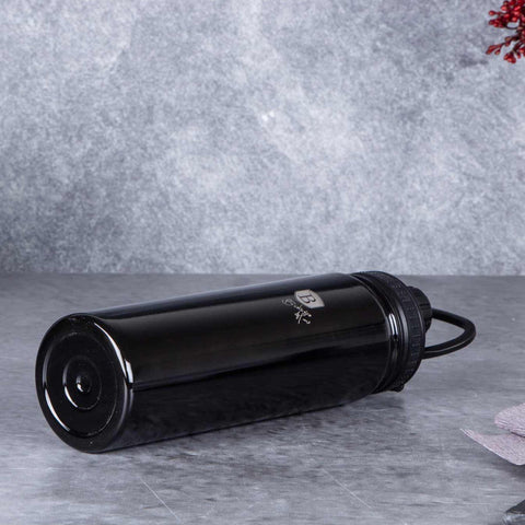 Product image of Sport bottle 720ml. Part of the Metallic Line Shiny Black Edition . Features: • Material: inner body 18/10 stainless steel • Capacity: 720 ml • Color: metallic black • Packing: half giftbox. (Studio view). Official Berlinger Haus product, boosted by Promintra sl.