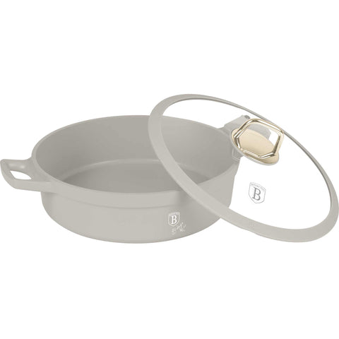 Product image of Shallow pot with lid 28cm. Part of the Sahara Collection . Features: • Material: cast aluminium • Shallow pot with lid Ø28*8 cm 4,2L • Color: matt cream • FREE 2 PCS DETACHABLE HEAT RESISTANT SILICONE HANDLE. (Studio view). Official Berlinger Haus product, boosted by Promintra sl.