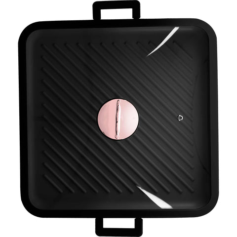 Product image of Square grill pan with lid 34cm. Part of the Black Rose Collection . Features: • Material: cast aluminium • Grill pan Ø34*4,5 cm • Color: matt black- rose gold • FREE 2 PCS DETACHABLE HEAT RESISTANT SILICONE HANDLE. (Studio view). Official Berlinger Haus product, boosted by Promintra sl.