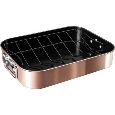 Product image of Roaster with rack. Part of the Metallic Line Rose Gold Edition . Features: • Material: carbon steel with titan non-stick coating • Size: 41,5*32*7,7 cm • Color: metallic rose gold. (Studio view). Official Berlinger Haus product, boosted by Promintra sl.